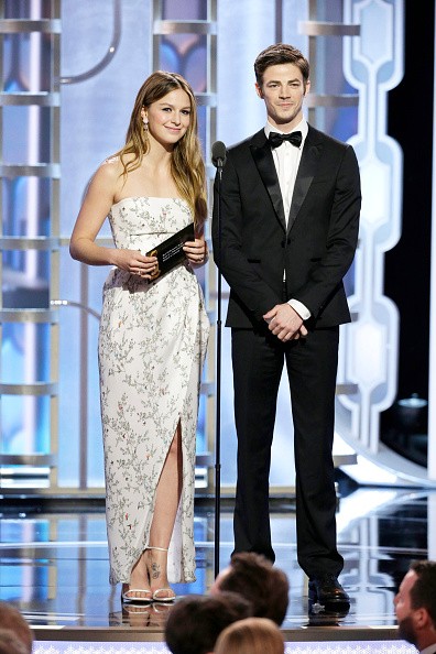 Melissa Benoist and Grant Gustin speak onstage during the 73rd Annual Golden Globe Awards at The Beverly Hilton Hotel on January 10, 2016 in Beverly Hills, California. 