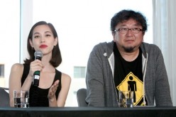 Actress Kiko Mizuhara (L) and director Shinji Higuchi attend the 'ATTACK ON TITAN' World Premiere press conference on July 14, 2015 in Hollywood, California.
