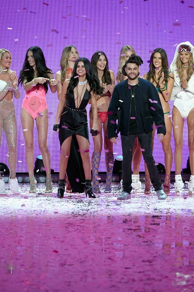 Selena Gomez and The Weeknd walk the runway during the 2015 Victoria's Secret Fashion Show at Lexington Avenue Armory on November 10, 2015 in New York City. 