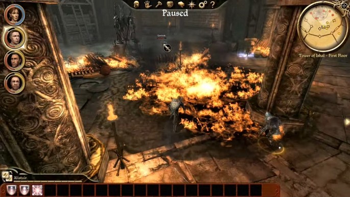 The player party fighting enemies in a flame-filled room in 'Dragon Age: Origins.'