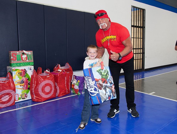 Hulk Hogan poses with a kid during his visit to the Hope Children's Home last Nov, 30, 2015.