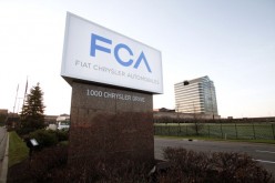 The Fiat Chrysler Automobiles (FCA) Group sign is shown at the Chrysler Group headquarters May 6, 2014 in Auburn Hills, Michigan.