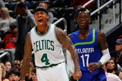  Isaiah Thomasof the Boston Celtics reacts after hitting a three-point basket against the Dennis Schroder of the Atlanta Hawks at Philips Arena on January 13, 2017 in Atlanta, Georgia. 