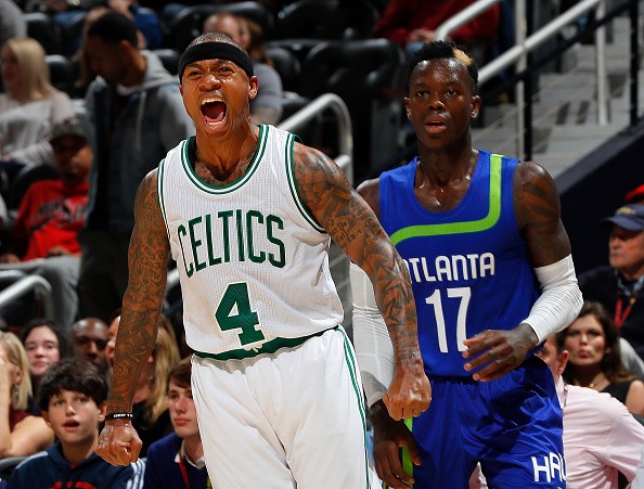  Isaiah Thomasof the Boston Celtics reacts after hitting a three-point basket against the Dennis Schroder of the Atlanta Hawks at Philips Arena on January 13, 2017 in Atlanta, Georgia. 