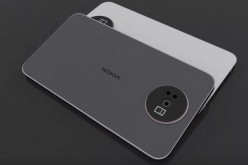 Two smartphones are placed on top of each other, one is black and the other is white. The particular smartphones represent the upcoming Nokia phones this year.