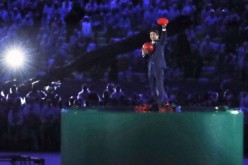 Japanese Prime Minister Shinzo Abe, dressed up as Super Mario, makes an appearance during the closing ceremony of the Rio de Janeiro Olympics on Aug. 21, 2016. 