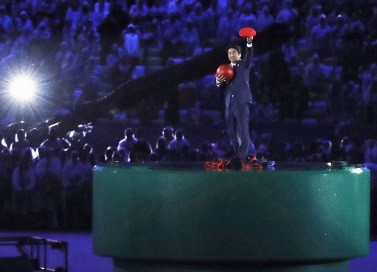 Japanese Prime Minister Shinzo Abe, dressed up as Super Mario, makes an appearance during the closing ceremony of the Rio de Janeiro Olympics on Aug. 21, 2016. 