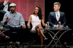 (L-R) Actors Jesse L. Martin, Candice Patton, and Rick Cosnett speak onstage at the 'The Flash' panel during the CW Network portion of the 2014 Summer Television Critics Association on July 18, 2014.