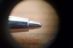 A magnified image of a ballpoint pen.