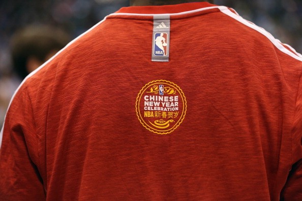 Shawn Marion of the Dallas Mavericks wears a shirt with the NBA logo and a Chinese New Year Celebration emblem at American Airlines Center on February 9, 2013 in Dallas, Texas. Shawn Marion #0 of the Dallas Mavericks wears a shirt with the NBA logo and a 