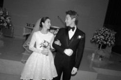 South Korean actors Rain and Kim Tae-Hee smile during their wedding at Gahoe-Dong Catholic Church on Jan. 19, 2017.