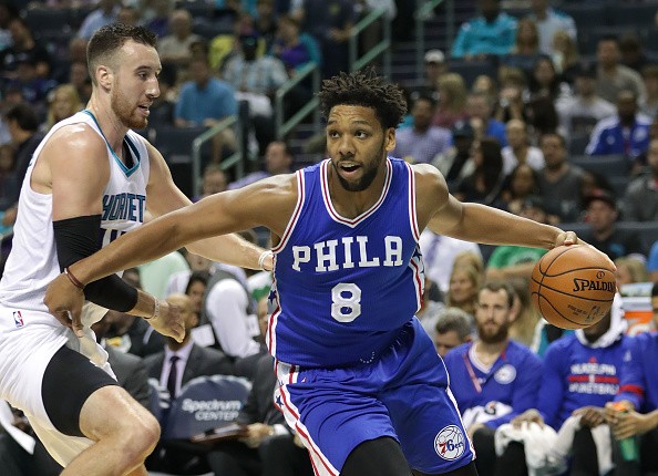 Jahlil Okafor of the Philadelphia 76ers drives to the basket against Frank Kaminsky III of the Charlotte Hornets during their game at Spectrum Center on November 2, 2016 in Charlotte, North Carolina. 