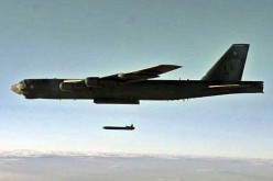 A B-52H Stratofortress unleashes an unarmed AGM-86B Air-Launched Cruise Missile during a test.           