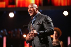 Actor Dwayne Johnson accepts the Favorite Premium Series Actor award for 'Ballers' onstage during the People's Choice Awards 2017 on Jan. 18, 2017.