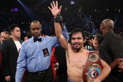 Manny Pacquiao of the Philippines poses after his unanimous-decision victory over Jessie Vargas at the Thomas & Mack Center on November 5, 2016 in Las Vegas, Nevada.