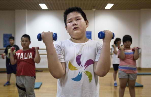 Obese children attend summer exercise camp to lose weight.
