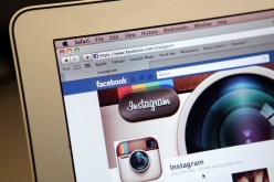 The photo-sharing app Instagram fan page is seen on the Facebook website on the Apple Safari web browser.