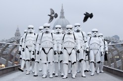 People dressed as Stormtroopers from the Star Wars franchise of films pose on the Millennium Bridge to promote the latest release in the series, 'Rogue One', on December 15, 2016 in London, England. 