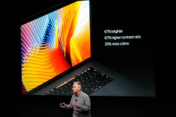  Apple Senior VP of Worldwide Marketing Phil Schiller introduces the all-new MacBook Pro which can run the macOS Sierra during a product launch event on October 27, 2016 in Cupertino, California.