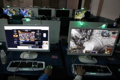 Young gamers play online games at an Internet bar in Huaibei in Anhui, China.