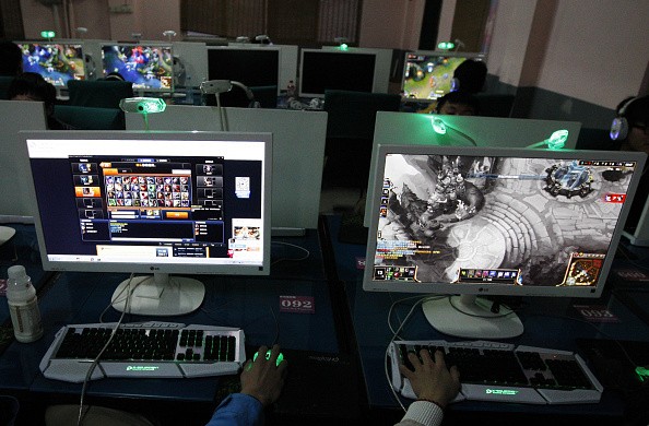 Young gamers play online games at an Internet bar in Huaibei in Anhui, China.