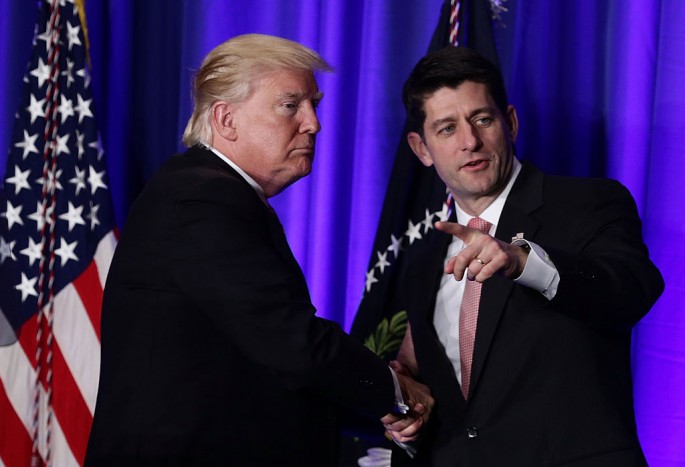 U.S. President Donald Trump (L) shakes hands with Speaker of the House Rep. Paul Ryan (R-WI) (R) during a luncheon at the Congress of Tomorrow Republican Member Retreat.
