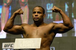 Mixed martial artist Daniel Cormier poses on the scale during his weigh-in for UFC 200 at T-Mobile Arena on July 8, 2016 in Las Vegas, Nevada. 
