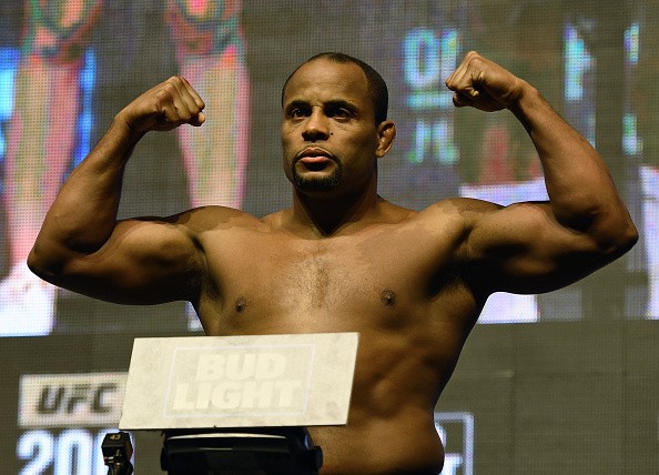 Mixed martial artist Daniel Cormier poses on the scale during his weigh-in for UFC 200 at T-Mobile Arena on July 8, 2016 in Las Vegas, Nevada. 