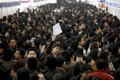 Chinese job seekers flock to a job fair.