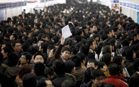Chinese job seekers flock to a job fair.