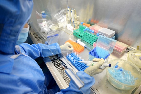 China-made detection reagent of Ebola virus is being processed on Aug. 26, 2014 in Shenzhen, Guangdong Province of China.