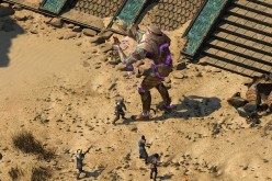 The party of heroes fight an animated giant in 'Pillars of Eternity 2: Deadfire.'