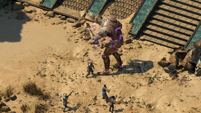 The party of heroes fight an animated giant in 'Pillars of Eternity 2: Deadfire.'