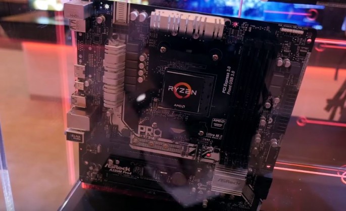 The AMD Ryzen processor is placed on a motherboard for display during CES 2017 event. 