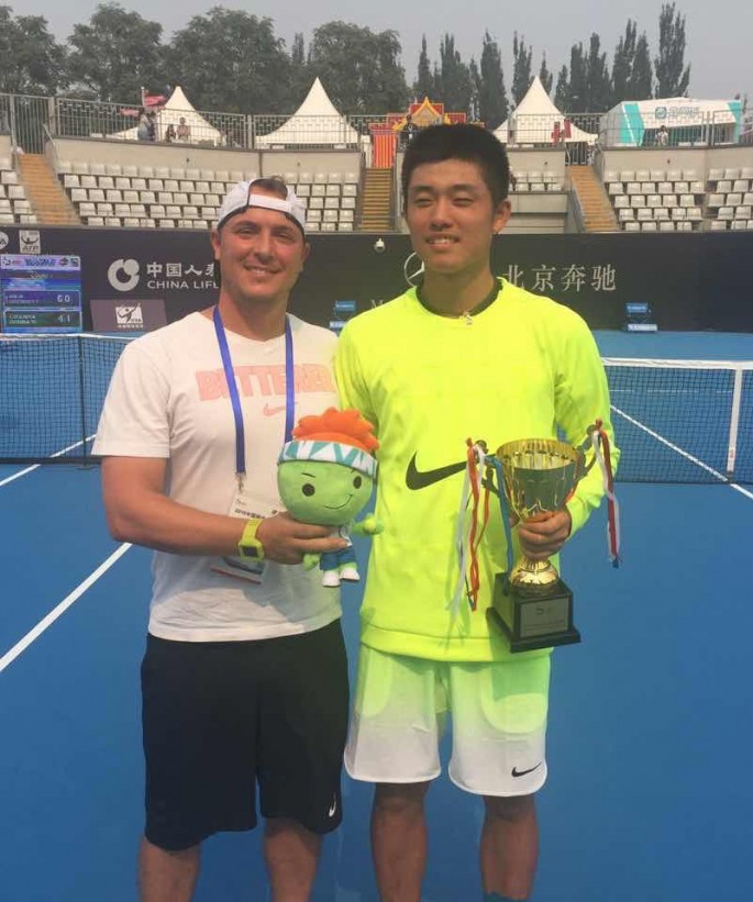 Chinese tennis sensation Wu Yibing (right)