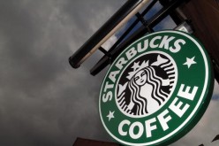 The Starbucks logo hangs outside one of the company's cafes in Northwich