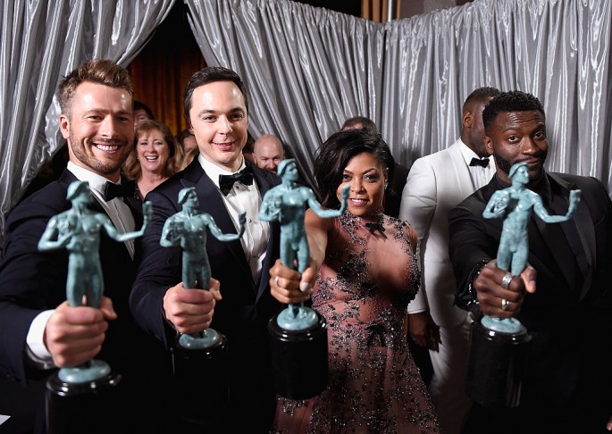 LOS ANGELES, CA - JANUARY 29: (L-R) Actors Glenn Powell, Jim Parsons, Taraji P. Henson, and Aldis Hodge, co-recipients of the Outstanding Cast in a Motion Picture award for 'Hidden Figures', pose backstage during The 23rd Annual Screen Actors Guild Awards
