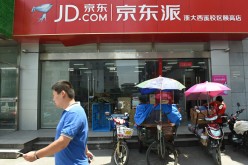Walmart supermarket entrance promoting JD.com in Hangzhou, Zhejiang Province of China.