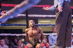 Roshaun Jones on the canvas after being knocked down by Cande Rochin in a boxing match last July 18, 2015.