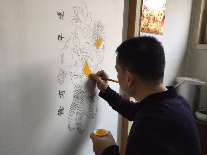 Huo’s family has been making woodprint New Year paintings for seven generations, and the clan shows no signs of stopping the practice.