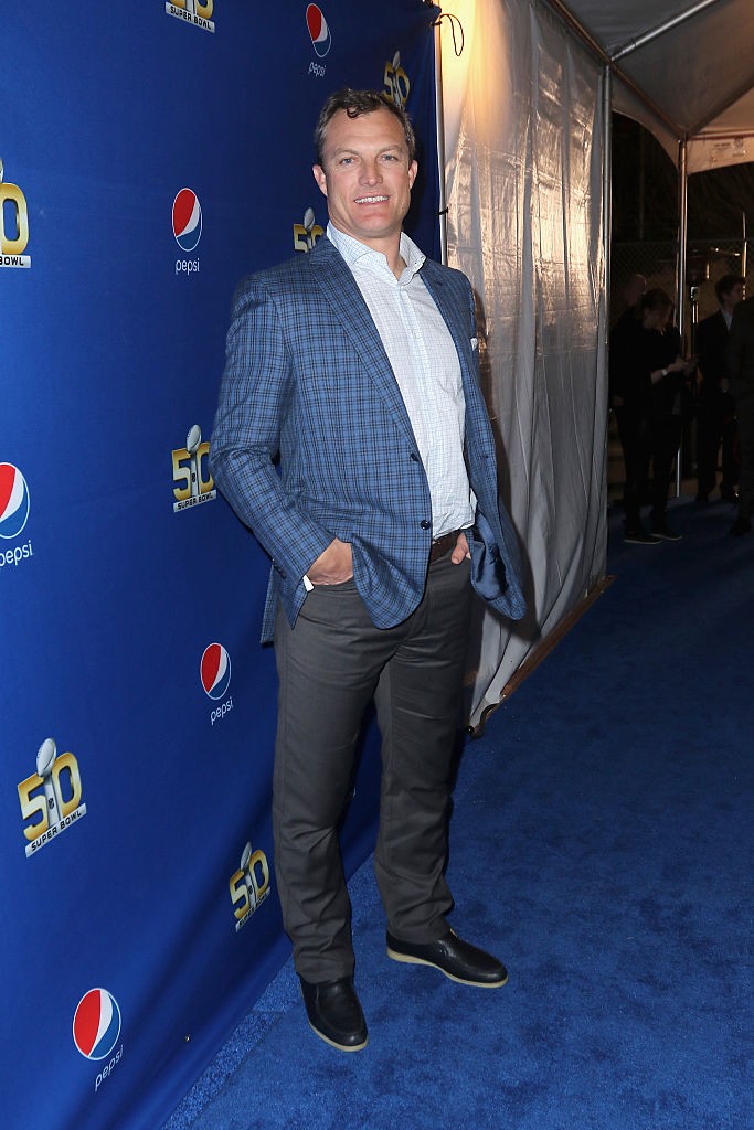  TV personality/retired NFL player John Lynch walks the Blue Carpet at the 2015 Pepsi Rookie of the Year Award Ceremony at Pepsi Super Friday Night at Pier 70 on February 5, 2016 in San Francisco, California.