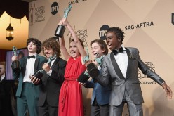 (L-R) Actors Finn Wolfhard, Gaten Matarazzo, Millie Bobby Brown, Noah Schnapp, and Caleb McLaughlin pose in the press room during the 23rd Annual Screen Actors Guild Awards on Jan. 29, 2017.