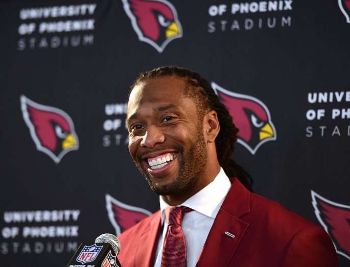 Larry Fitzgerald of the Arizona Cardinals smiles during a post game interview after a 44-6 win over the Los Angeles Rams at Los Angeles Memorial Coliseum.