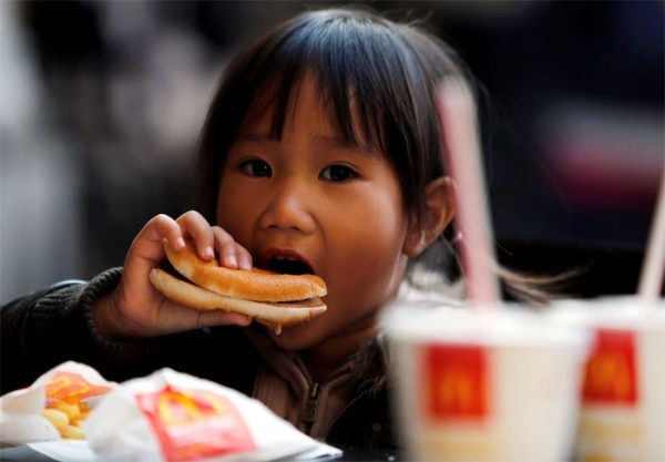 Kid eating McDonald's