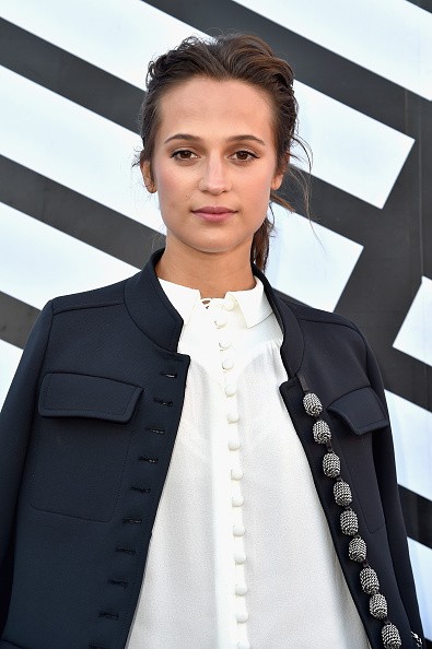 Alicia Vikander attends the Louis Vuitton show as part of the Paris Fashion Week Womenswear Spring/Summer 2017 on October 5, 2016 in Paris, France.