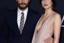 Actors Jamie Dornan and Dakota Johnson attends the premiere of Universal Pictures' 'Fifty Shades Darker' at The Theatre at Ace Hotel on February 2, 2017 in Los Angeles, California.