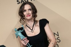  Winona Ryder poses in the press room with her award for Outstanding Performance by an Ensemble in a Drama Series for 'Stranger Things' at the 23rd Annual Screen Actors Guild Awards at The Shrine Expo Hall on January 29, 2017 in Los Angeles, California.