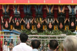 A 13-year-old girl died after she was thrown from a spinning ride in a Chongqing amusement park.