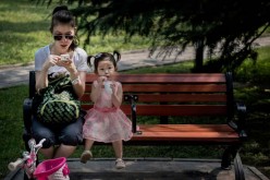 Chinese society still expects child rearing to be the sole responsibility of mothers.