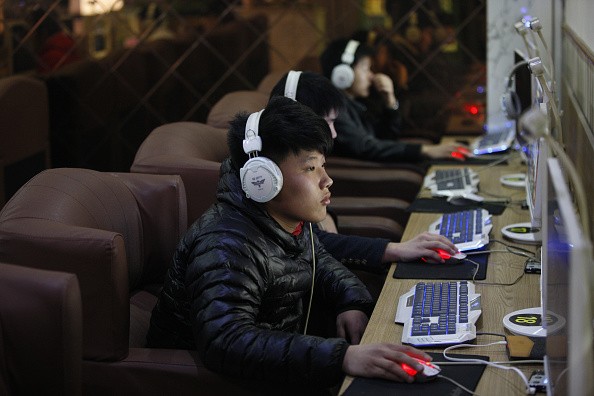 Adolescents play online games at an Internet bar in Huaibei, Anhui, China.